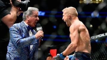 NEW YORK, NY - NOVEMBER 04: Bruce Buffer introduces TJ Dillashaw for his UFC bantamweight championship bout against Cody Garbrandt during the UFC 217 event at Madison Square Garden on November 4, 2017 in New York City. (Photo by Jeff Bottari/Zuffa LLC/Zuffa LLC via Getty Images)