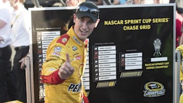 Nov 13, 2016; Avondale, AZ, USA; Sprint Cup Series driver Joey Logano (22) places his name on the chase grid after winning the Can-Am 500 at Phoenix International Raceway. Mandatory Credit: Jerome Miron-USA TODAY Sports