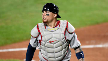 BALTIMORE, MD - AUGUST 20: Christian Vazquez #7 of the Boston Red Sox catches against the Baltimore Orioles at Oriole Park at Camden Yards on August 20, 2020 in Baltimore, Maryland. (Photo by G Fiume/Getty Images)
