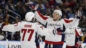 Dec 9, 2016; Buffalo, NY, USA; Washington Capitals defenseman John Carlson (74) celebrates his goal with right wing T.J. Oshie (77) during the third period against the Buffalo Sabres at KeyBank Center. Washington beat Buffalo 4-1. Mandatory Credit: Timothy T. Ludwig-USA TODAY Sports