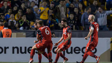 MONTERREY, MEXICO - MARCH 13: Sebastian Giovinco of Toronto celebrates with teammates after scoring his team's second goalduring the quarterfinals second leg match between Tigres UANL and Toronto FC as part of the CONCACAF Champions League 2018 at Universitario Stadium on March 13, 2018 in Monterrey, Mexico. (Photo by Azael Rodriguez/Getty Images)
