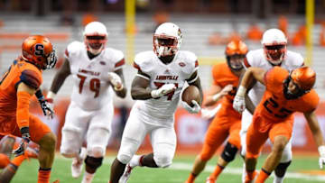 Sep 9, 2016; Syracuse, NY, USA; Louisville Cardinals running back Jeremy Smith (34) runs with the ball against the Syracuse Orange during the fourth quarter at the Carrier Dome. Louisville defeated Syracuse 62-28. Mandatory Credit: Rich Barnes-USA TODAY Sports