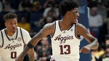 Texas A&M forward Solomon Washington (13) celebrates a dunk against Vanderbilt during the first half of a semifinal SEC Men’s Basketball Tournament game at Bridgestone Arena Saturday, March 11, 2023, in Nashville, Tenn.Sec Basketball Vanderbilt Vs Texas A M