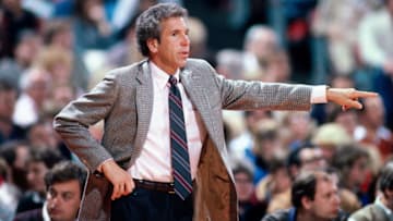 PORTLAND, OR - 1987: Phoenix Suns head coach John Macleod points against the Portland Trailblazers at the Veterans Memorial Coliseum in Portland, Oregon circa 1987. NOTE TO USER: User expressly acknowledges and agrees that, by downloading and or using this photograph, User is consenting to the terms and conditions of the Getty Images License Agreement. Mandatory Copyright Notice: Copyright 1987 NBAE (Photo by Brian Drake/NBAE via Getty Images)