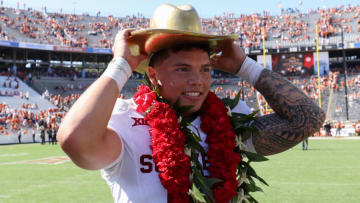 Oct 7, 2023; Dallas, Texas, USA; Oklahoma Sooners quarterback Dillon Gabriel (8) celebrates with the golden hat after the win against the Texas Longhorns at the Cotton Bowl. Mandatory Credit: Kevin Jairaj-USA TODAY Sports