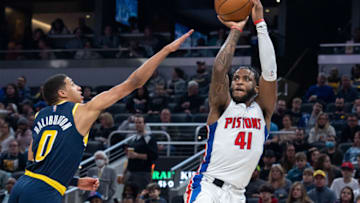 Detroit Pistons forward Saddiq Bey (41) shoots the ball while Indiana Pacers guard Tyrese Haliburton (0) defends in the first half at Gainbridge Fieldhouse. Mandatory Credit: Trevor Ruszkowski-USA TODAY Sports