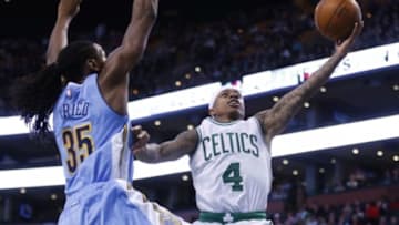Jan 27, 2016; Boston, MA, USA; Boston Celtics guard Isaiah Thomas (4) shoots against Denver Nuggets forward Kenneth Faried (35) in the second half at TD Garden. The Celtics defeated Denver 111-103. Mandatory Credit: David Butler II-USA TODAY Sports