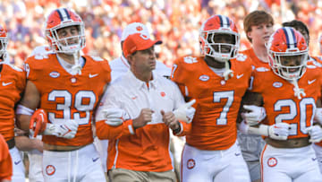 Nov 18, 2023; Clemson, South Carolina, USA; Clemson Tigers head coach Dabo Swinney and players do the Walk of Champions before kickoff against the North Carolina Tar Heels at Memorial Stadium. Mandatory Credit: Ken Ruinard-USA TODAY Sports