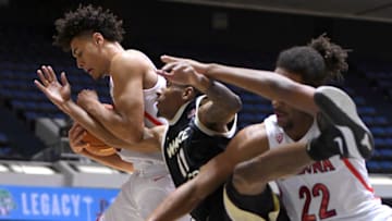 ANAHEIM, CA - DECEMBER 01: Josh Green #0 and Zeke Nnaji #22 of the Arizona Wildcats and Torry Johnson #11 of the Wake Forest Demon Deacons battle for a rebound in the first half of the game during the Wooden Legacy at the Anaheim Convention Center at on December 1, 2019 in Anaheim, California. (Photo by Jayne Kamin-Oncea/Getty Images)