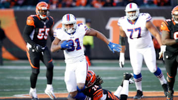 CINCINNATI, OH - NOVEMBER 20: Adam Jones #24 of the Cincinnati Bengals tackles Jonathan Williams #31 of the Buffalo Bills during the fourth quarter at Paul Brown Stadium on November 20, 2016 in Cincinnati, Ohio. Buffalo defeated Cincinnati 16-12. (Photo by Joe Robbins/Getty Images)
