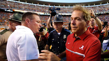 KNOXVILLE, TN - OCTOBER 15: Head coach Nick Saban of the Alabama Crimson Tide shakes hands with head coach Butch Jones of the Tennessee Volunteers after their 49-10 win at Neyland Stadium on October 15, 2016 in Knoxville, Tennessee. (Photo by Kevin C. Cox/Getty Images)
