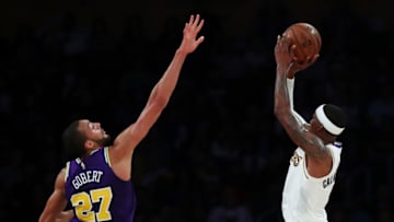 LOS ANGELES, CALIFORNIA - APRIL 07: Kentavious Caldwell-Pope #1 of the Los Angeles Lakers shoots the ball against Rudy Gobert #27 of the Utah Jazz during the fourth quarter at Staples Center on April 07, 2019 in Los Angeles, California. NOTE TO USER: User expressly acknowledges and agrees that, by downloading and or using this photograph, User is consenting to the terms and conditions of the Getty Images License Agreement. (Photo by Yong Teck Lim/Getty Images)