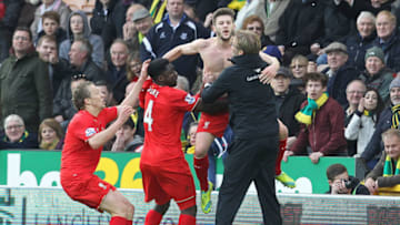 Liverpool's midfielder Adam Lallana (Photo credit should read LINDSEY PARNABY/AFP via Getty Images)