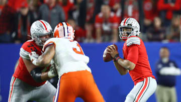 Dec 28, 2019; Glendale, AZ, USA; Ohio State Buckeyes quarterback Justin Fields (1) against the Clemson Tigers during the 2019 Fiesta Bowl college football playoff semifinal game at State Farm Stadium. Mandatory Credit: Mark J. Rebilas-USA TODAY Sports