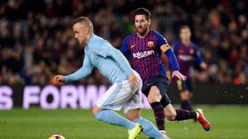 BARCELONA, SPAIN - DECEMBER 22: Stanislav Lobotka of Celta Vigo is under pressure by Lionel Messi of Barcelona during the La Liga match between FC Barcelona and RC Celta de Vigo at Camp Nou on December 22, 2018 in Barcelona, Spain. (Photo by Alex Caparros/Getty Images)