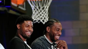 Kawhi Leonard, Paul George LAC intro discuss OKC Thunder trade (Photo by Kevork Djansezian/Getty Images)