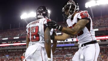 Nov 3, 2016; Tampa, FL, USA; Atlanta Falcons wide receiver Taylor Gabriel (18) celebrates after scoring a touchdown against the Tampa Bay Buccaneers during the first half at Raymond James Stadium. Mandatory Credit: Kim Klement-USA TODAY Sports