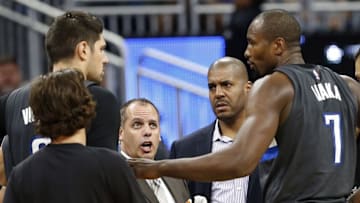 Nov 5, 2016; Orlando, FL, USA; Orlando Magic head coach Frank Vogel calls play as he huddles up against the Washington Wizards during the second quarter at Amway Center. Mandatory Credit: Kim Klement-USA TODAY Sports
