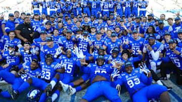 CHARLOTTE, NORTH CAROLINA - DECEMBER 31: The Kentucky Wildcats celebrate after defeating the Virginia Tech Hokies 37-30 in the Belk Bowl at Bank of America Stadium on December 31, 2019 in Charlotte, North Carolina. (Photo by Streeter Lecka/Getty Images)