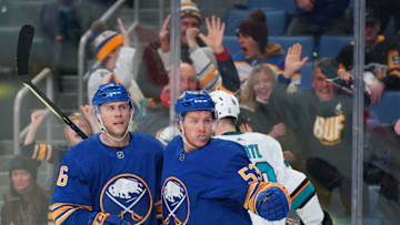 BUFFALO, NY - JANUARY 6: Jeff Skinner #53 celebrates his goal with Ethan Prow #6 of the Buffalo Sabres after scoring during the second period against the San Jose Sharks at KeyBank Center on January 6, 2022 in Buffalo, New York. (Photo by Kevin Hoffman/Getty Images)
