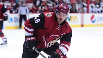 Oct 2, 2015; Glendale, AZ, USA; Arizona Coyotes left wing Jordan Martinook (48) defends during the second period against the San Jose Sharks at Gila River Arena. Mandatory Credit: Matt Kartozian-USA TODAY Sports