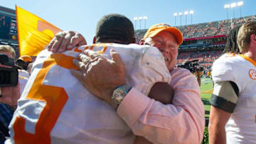 AUBURN, AL - OCTOBER 13: Director of Athletics Phillip Fulmer celebrates with defensive lineman Kyle Phillips #5 of the Tennessee Volunteers after defeating the Auburn Tigers at Jordan-Hare Stadium on October 13, 2018 in Auburn, Alabama. (Photo by Michael Chang/Getty Images)