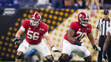 Auburn footballJan 10, 2022; Indianapolis, IN, USA; Alabama Crimson Tide offensive lineman Seth McLaughlin (56) and Javion Cohen (70) against the Georgia Bulldogs in the 2022 CFP college football national championship game at Lucas Oil Stadium. Mandatory Credit: Mark J. Rebilas-USA TODAY Sports