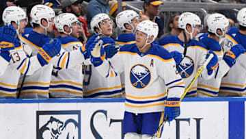 Feb 25, 2022; St. Louis, Missouri, USA; Buffalo Sabres right wing Kyle Okposo (21) is congratulated by teammates after scoring a goal against the St. Louis Blues during the second period at Enterprise Center. Mandatory Credit: Jeff Le-USA TODAY Sports