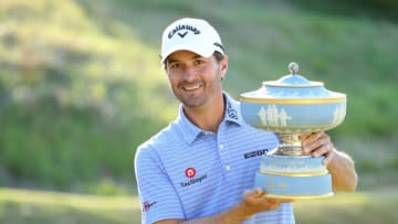 AUSTIN, TEXAS - MARCH 31: Kevin Kisner of the United States celebrates with the Walter Hagen Cup after defeating Matt Kuchar of the United States 3&2 during the final round of the World Golf Championships-Dell Technologies Match Play at Austin Country Club on March 31, 2019 in Austin, Texas. (Photo by Warren Little/Getty Images)