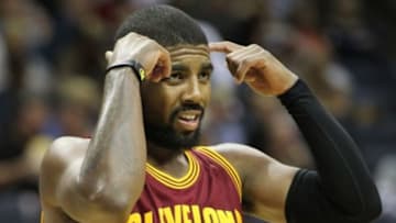 Oct 22, 2014; Memphis, TN, USA; Cleveland Cavaliers guard Kyrie Irving (3) gestures to a teammate during the game against the Memphis Grizzlies at FedExForum. Memphis defeated Cleveland 96-92. Mandatory Credit: Nelson Chenault-USA TODAY Sports