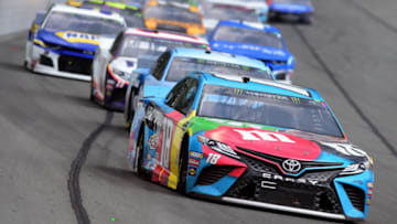 LONG POND, PENNSYLVANIA - JUNE 02: Kyle Busch, driver of the #18 M&M's Hazelnut Toyota, leads a pack of cars during the Monster Energy NASCAR Cup Series Pocono 400 at Pocono Raceway on June 02, 2019 in Long Pond, Pennsylvania. (Photo by Jared C. Tilton/Getty Images)