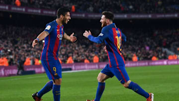 BARCELONA, SPAIN - DECEMBER 18: Lionel Messi (R) of FC Barcelona celebrates with his team mate Luis Suarez after scoring his team's fourth goal during the La Liga match between FC Barcelona and RCD Espanyol at the Camp Nou stadium on December 18, 2016 in Barcelona, Spain. (Photo by David Ramos/Getty Images)