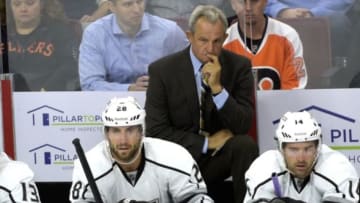 Oct 28, 2014; Philadelphia, PA, USA; Los Angeles Kings head coach Darryl Sutter behind the bench against the Philadelphia Flyers during the third period at Wells Fargo Center. The Flyers defeated the Kings, 3-2 in overtime. Mandatory Credit: Eric Hartline-USA TODAY Sports