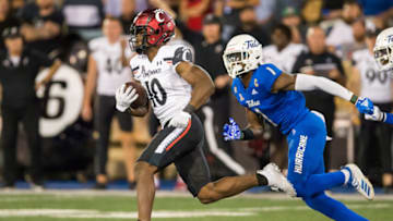Cincinnati Bearcats running back Charles McClelland runs against the Tulsa Golden Hurricane. USA Today.