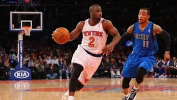 Feb 24, 2014; New York, NY, USA; New York Knicks point guard Raymond Felton (2) dribbles the ball in front of Dallas Mavericks shooting guard Monta Ellis (11) during the third quarter at Madison Square Garden. Dallas Mavericks won 110-108. Mandatory Credit: Anthony Gruppuso-USA TODAY Sports