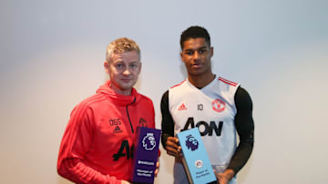MANCHESTER, ENGLAND - FEBRUARY 07: Barclays Manager of the month Ole Gunnar Solskjaer (L) and EA Sports Player of the Month Marcus Rashford pose at Aon Training Complex on February 07, 2019 in Manchester, England. (Photo by Jan Kruger/Getty Images for Premier League)