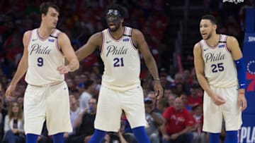 PHILADELPHIA, PA - MAY 7: Dario Saric #9, Joel Embiid #21, and Ben Simmons #25 of the Philadelphia 76ers look on against the Boston Celtics during Game Four of the Eastern Conference Second Round of the 2018 NBA Playoff at Wells Fargo Center on May 7, 2018 in Philadelphia, Pennsylvania. NOTE TO USER: User expressly acknowledges and agrees that, by downloading and or using this photograph, User is consenting to the terms and conditions of the Getty Images License Agreement. (Photo by Mitchell Leff/Getty Images)