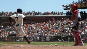 Jul 3, 2014; San Francisco, CA, USA; San Francisco Giants left fielder Gregor Blanco (7) crosses home plate against the St. Louis Cardinals during the third inning at AT&T Park. Mandatory Credit: Ed Szczepanski-USA TODAY Sports