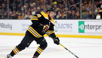 BOSTON, MASSACHUSETTS - DECEMBER 19: Matt Grzelcyk #48 of the Boston Bruins skates against the New York Islanders during the third period at TD Garden on December 19, 2019 in Boston, Massachusetts. (Photo by Maddie Meyer/Getty Images)
