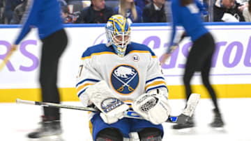 Nov 4, 2023; Toronto, Ontario, CAN; Buffalo Sabres goalie Devon Levi (27) rests on the ice during an ice cleaning break against the Toronto Maple Leafs in the third period at Scotiabank Arena. Mandatory Credit: Dan Hamilton-USA TODAY Sports