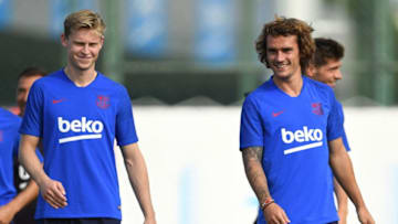 BARCELONA, SPAIN - JULY 15: Frenkie de Jong (L) and Antoine Griezmann of FC Barcelona look on during a training session at Ciutat Esportiva of Sant Joan Despi on July 15, 2019 in Barcelona, Spain. (Photo by David Ramos/Getty Images)
