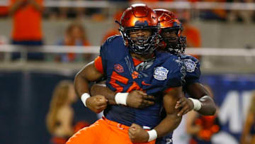 ORLANDO, FL - DECEMBER 28: Syracuse Orange defensive lineman Kendall Coleman (55) celebrates during the 2018 Camping World Bowl between the West Virginia Mountaineers and the Syracuse Orange on December 28, 2018 at Camping World Stadium in Orlando, Fl. (Photo by David Rosenblum/Icon Sportswire via Getty Images)