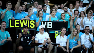 SUZUKA, JAPAN - OCTOBER 07: Race winner Lewis Hamilton of Great Britain and Mercedes GP and second place Valtteri Bottas of Finland and Mercedes GP celebrate with their team after the Formula One Grand Prix of Japan at Suzuka Circuit on October 7, 2018 in Suzuka. (Photo by Charles Coates/Getty Images)