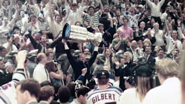 Rangers coach Mike Keenan celebrates with the Stanley Cup after defeating Vancouver 3-2 in game 7 of the Stanley Cup finals at Madison Square Garden June 14, 1994.Rangers Win Stanley Cup