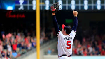 ATLANTA, GA - SEPTEMBER 22: Freddie Freeman #5 of the Atlanta Braves celebrates after clinching the NL East Division against the Philadelphia Phillies at SunTrust Park on September 22, 2018 in Atlanta, Georgia. (Photo by Daniel Shirey/Getty Images)