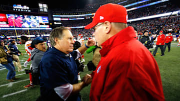 FOXBORO, MA - JANUARY 16: Head coach Bill Belichick of the New England Patriots and head coach Andy Reid of the Kansas City Chiefs shake hands after the AFC Divisional Playoff Game at Gillette Stadium on January 16, 2016 in Foxboro, Massachusetts. The Patriots defeated the Chiefs 27-20. (Photo by Al Bello/Getty Images)