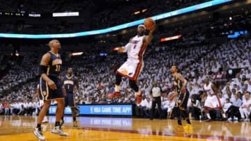 May 26, 2014; Miami, FL, USA; Miami Heat forward LeBron James (6) sails to the basket past Indiana Pacers forward David West (21) in game four of the Eastern Conference Finals of the 2014 NBA Playoffs at American Airlines Arena. Mandatory Credit: Steve Mitchell-USA TODAY Sports
