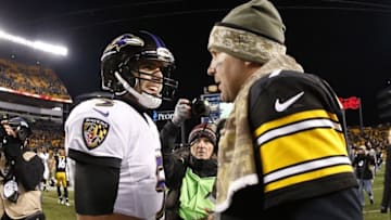 Nov 2, 2014; Pittsburgh, PA, USA; Baltimore Ravens quarterback Joe Flacco (5) and Pittsburgh Steelers quarterback Ben Roethlisberger (right) shake hands after their game at Heinz Field. The Steelers won 43-23. Mandatory Credit: Charles LeClaire-USA TODAY Sports