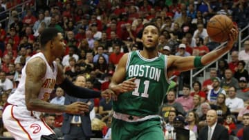 Apr 26, 2016; Atlanta, GA, USA; Boston Celtics guard Evan Turner (11) shoots the ball against the Atlanta Hawks in the second quarter in game five of the first round of the NBA Playoffs at Philips Arena. Mandatory Credit: Brett Davis-USA TODAY Sports