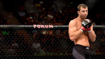 INGLEWOOD, CA - JUNE 04: Luke Rockhold prepares in the Octagon for his fight against Michael Bisping in their UFC middleweight championship bout during the UFC 199 event at The Forum on June 4, 2016 in Inglewood, California. (Photo by Harry How/Zuffa LLC/Zuffa LLC via Getty Images)